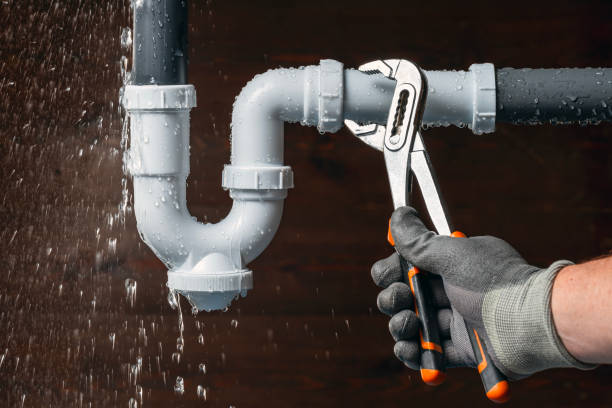 Professional Drain Cleaning technician working in Mountainburg, AR